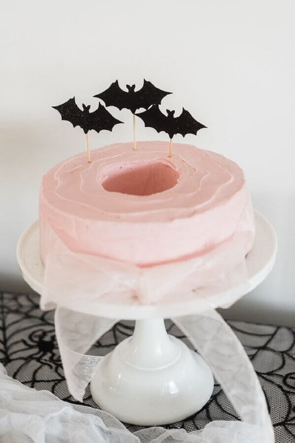 cake decorated for simple children's party with paper bats on top Photo 100 Layer Cakelet