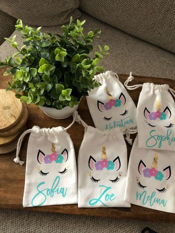 Unicorn surprise bag with children's names stamped on it