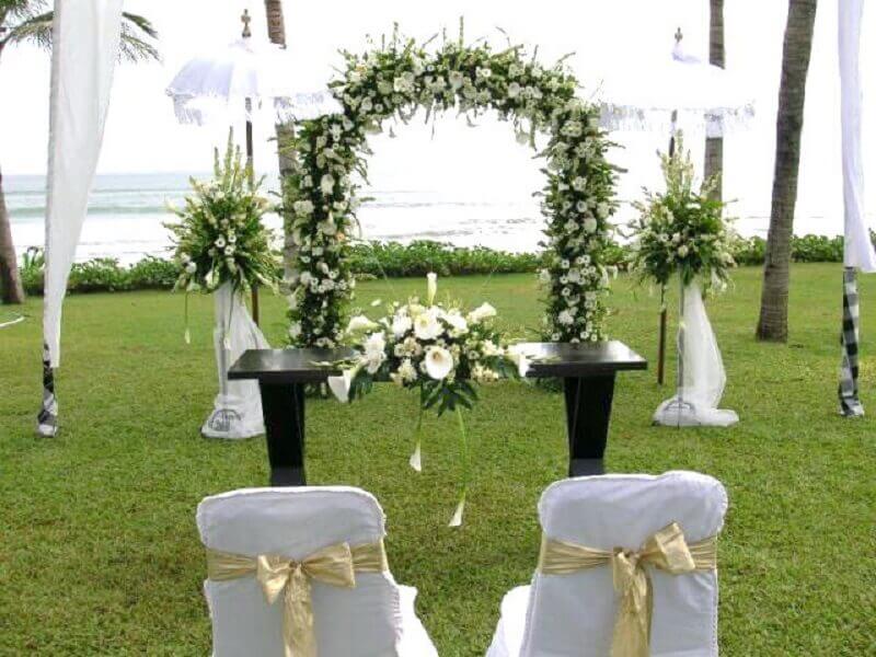 wedding altar with a bow of flowers