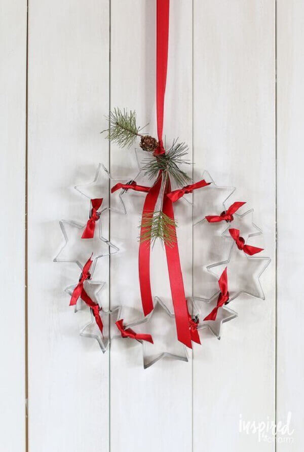 Christmas crafts with transparent star garland and red ribbon